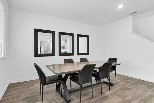 a room with table and windows