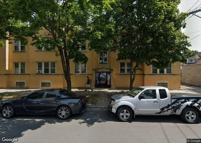 a car parked in front of a house