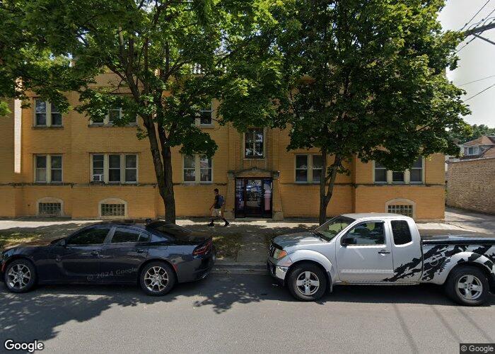 a car parked in front of a house
