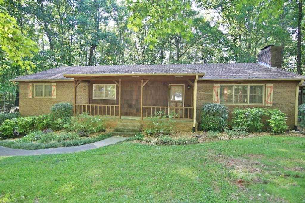 1285 Red Rock Road Northwest Acworth, GA 30101 - Photo 1 of 1 a view of a house with yard and a tree