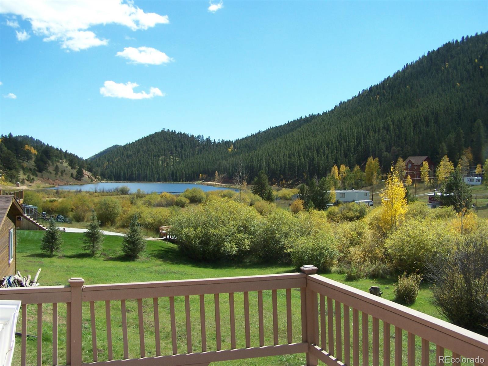 282 Bishop Road Bailey, CO 80421 - Photo 2 of 11 a view of lake from balcony