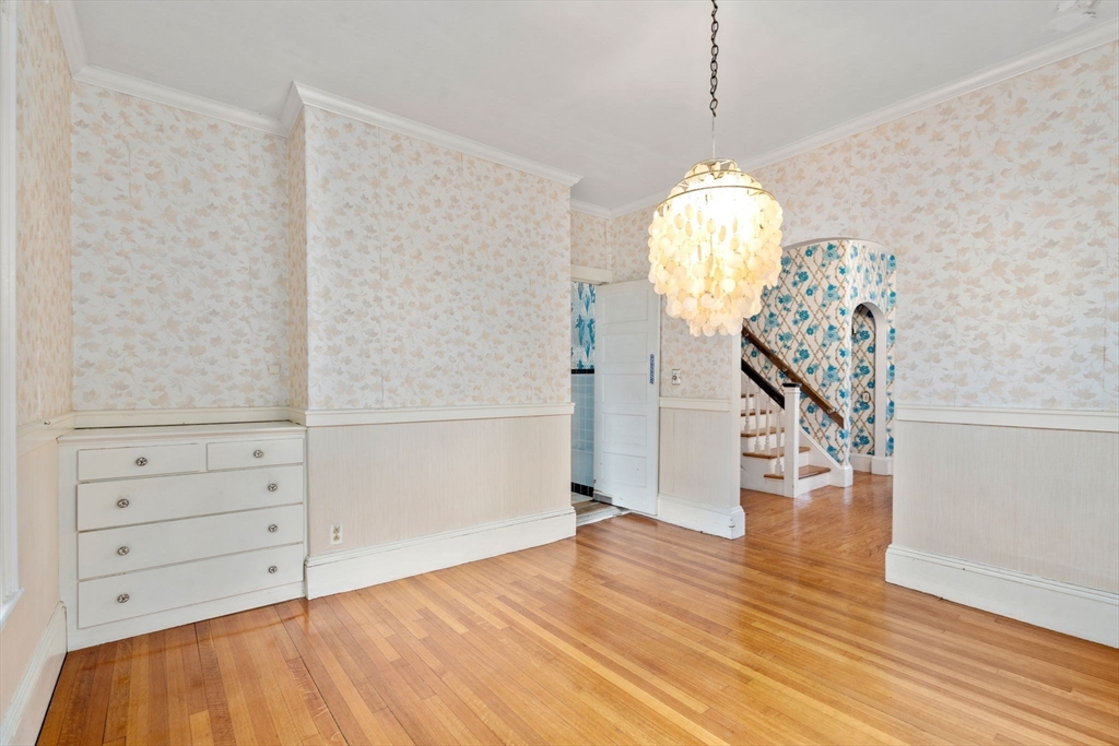 187 Clark Road Brookline, MA 02445 - Photo 21 of 40 a view of empty room with wooden floor