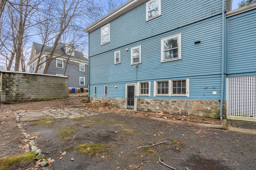 187 Clark Road Brookline, MA 02445 - Photo 38 of 40 a front view of a house with trees