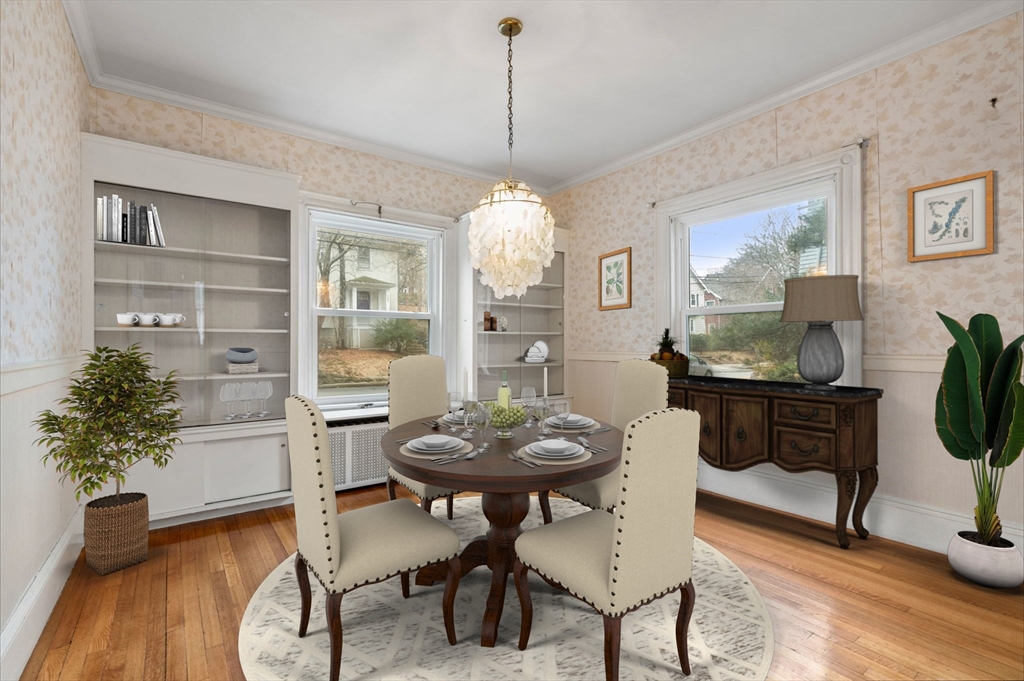 187 Clark Road Brookline, MA 02445 - Photo 39 of 40 a view of a dining room with furniture and wooden floor
