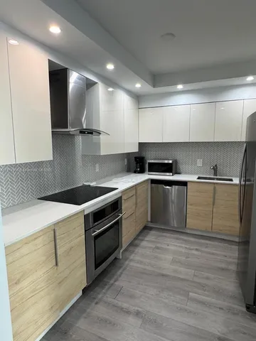 a view of a building with sitting area