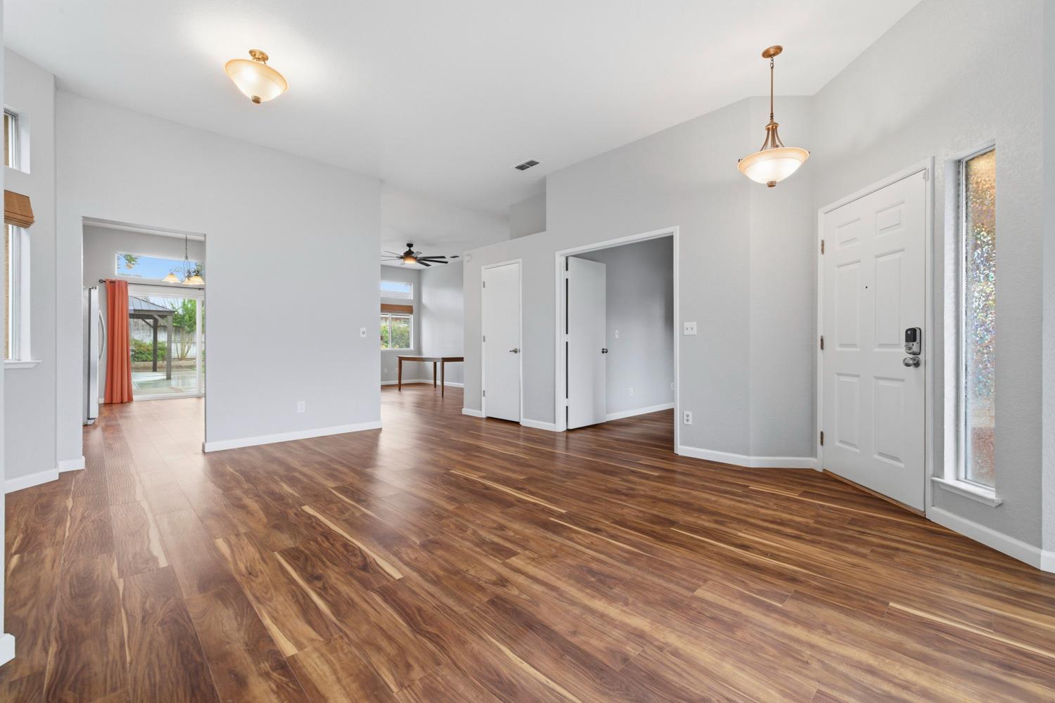 969 Colson Way Galt, CA 95632 - Photo 9 of 38 a view of empty room with wooden floor
