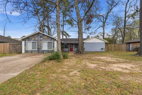 a house with trees in front of it