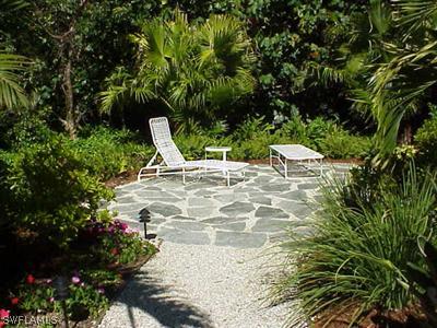 1404 Sand Castle Road Sanibel, FL 33957 - Photo 2 of 10 a view of an outdoor space with a lake view