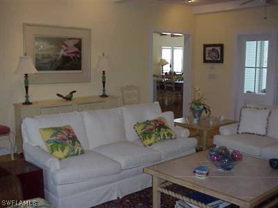 1404 Sand Castle Road Sanibel, FL 33957 - Photo 4 of 10 a living room with furniture and window