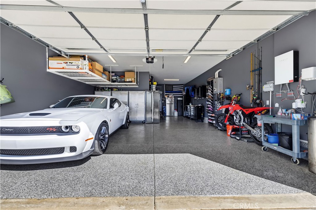 28445 Sunny Ridge Terrace Castaic, CA 91384 - Photo 46 of 74 3 Car Tandem Garage w/ Hanging Storage