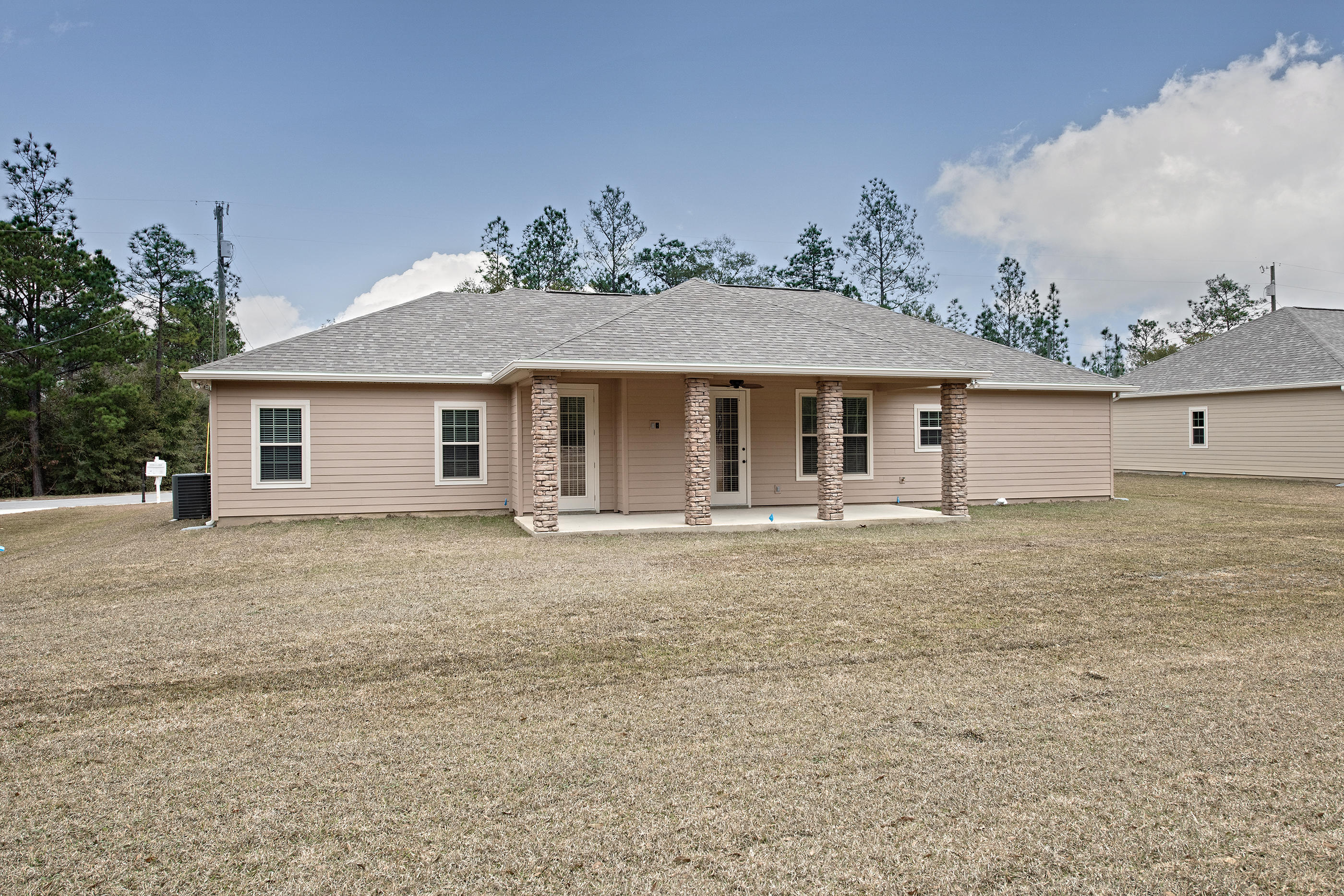 6210 Timberland Ridge Drive Crestview, FL 32539 - Photo 3 of 37 front view of a house with a yard