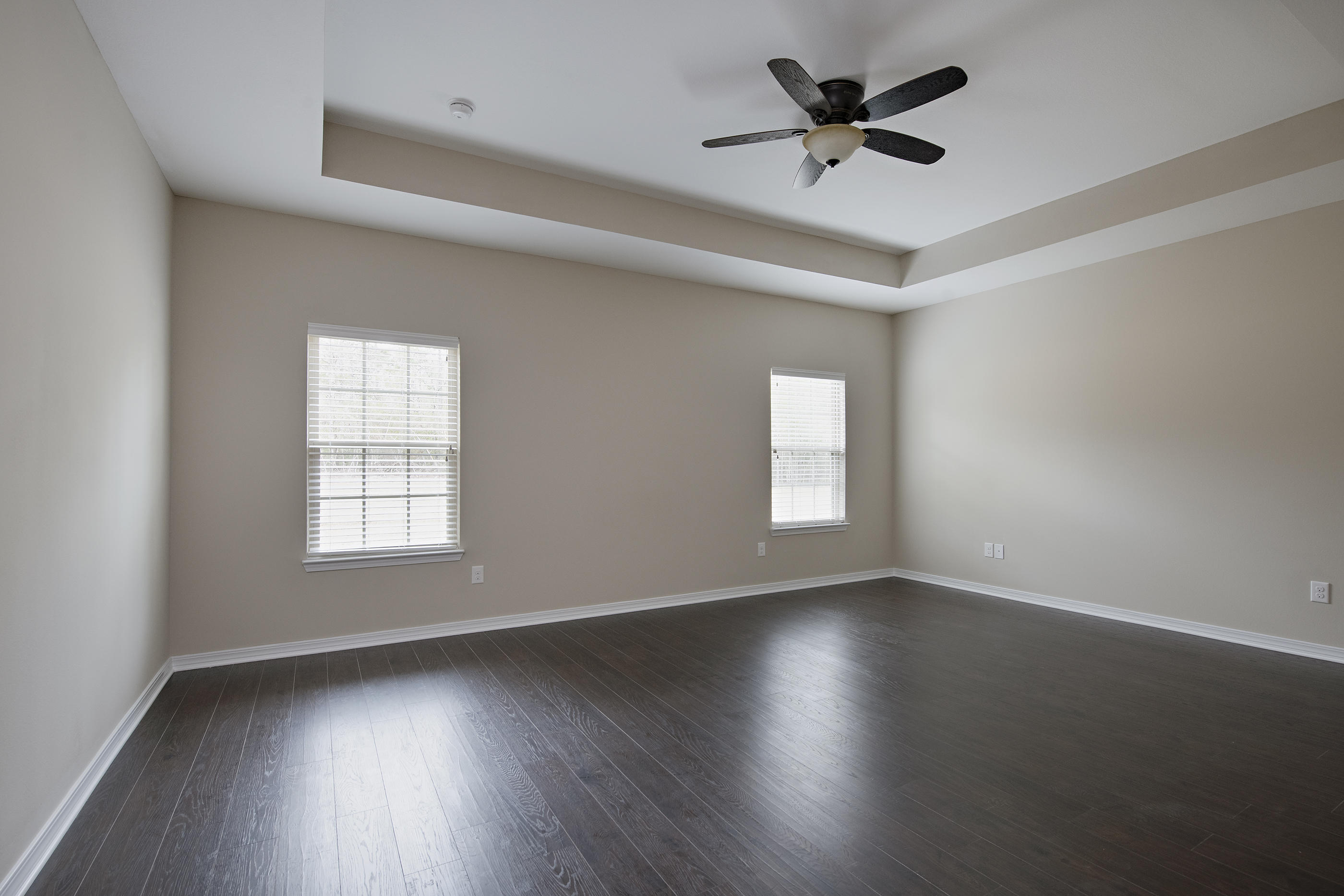 6210 Timberland Ridge Drive Crestview, FL 32539 - Photo 8 of 37 a view of an empty room with wooden floor and a window