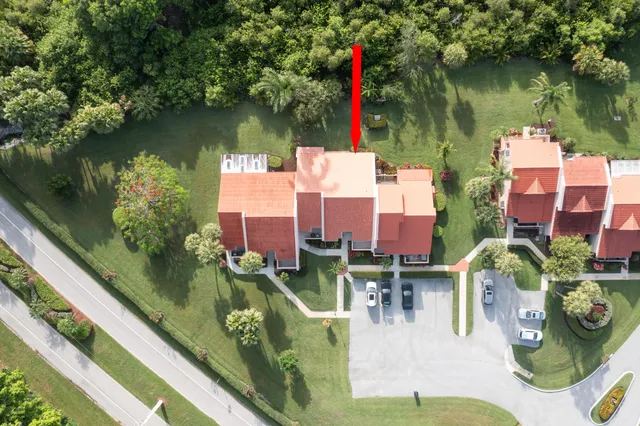 swimming pool view with a lake view