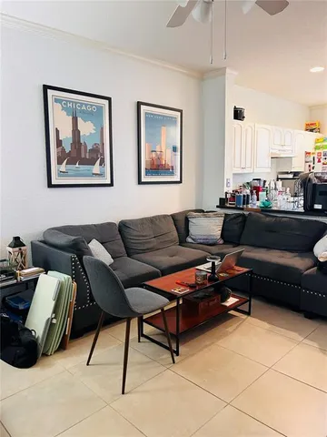 a view of workspace with a fireplace and cabinet