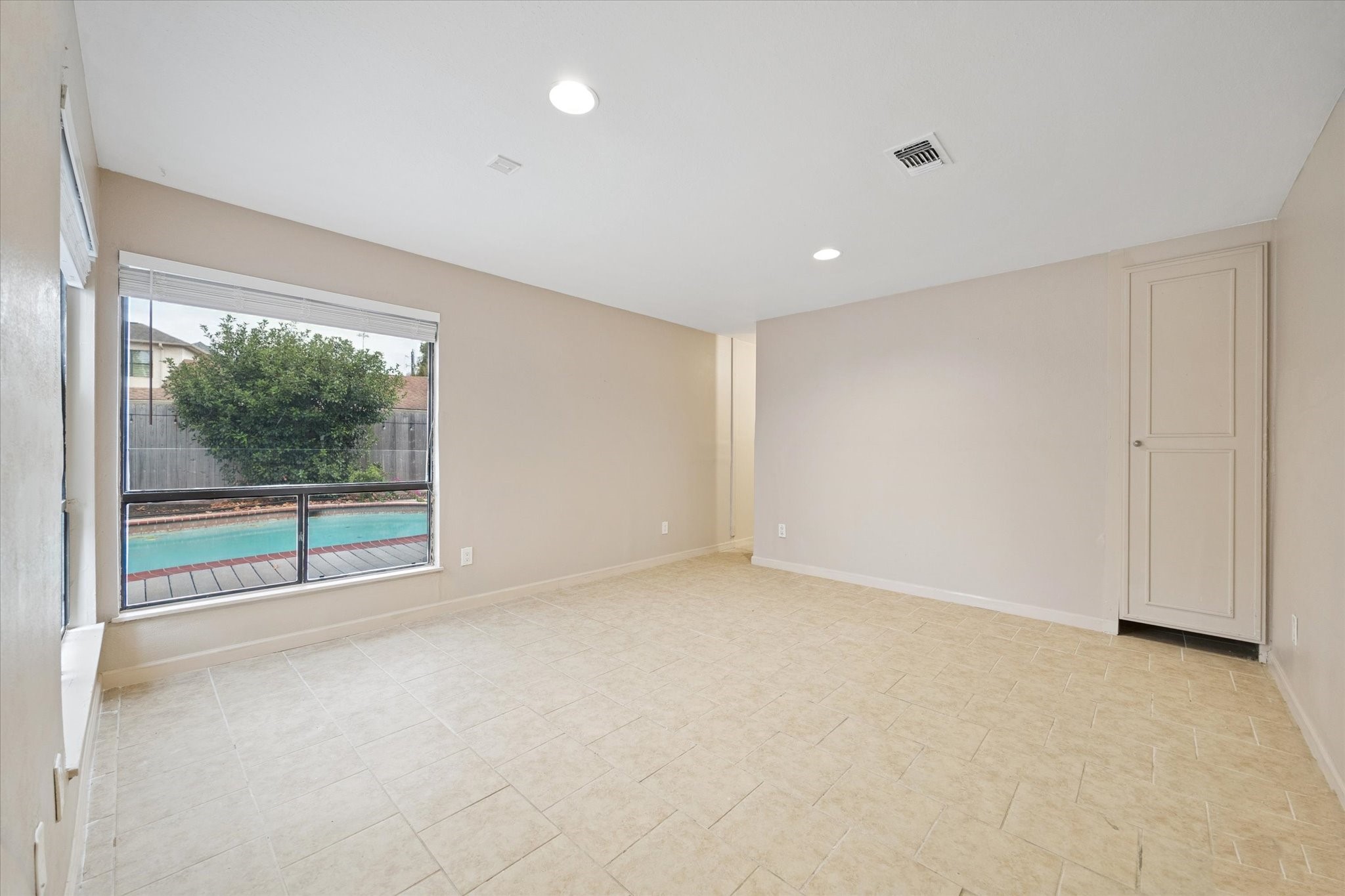4919 Valkeith Drive Houston, TX 77096 - Photo 15 of 29 a view of an empty room with a window