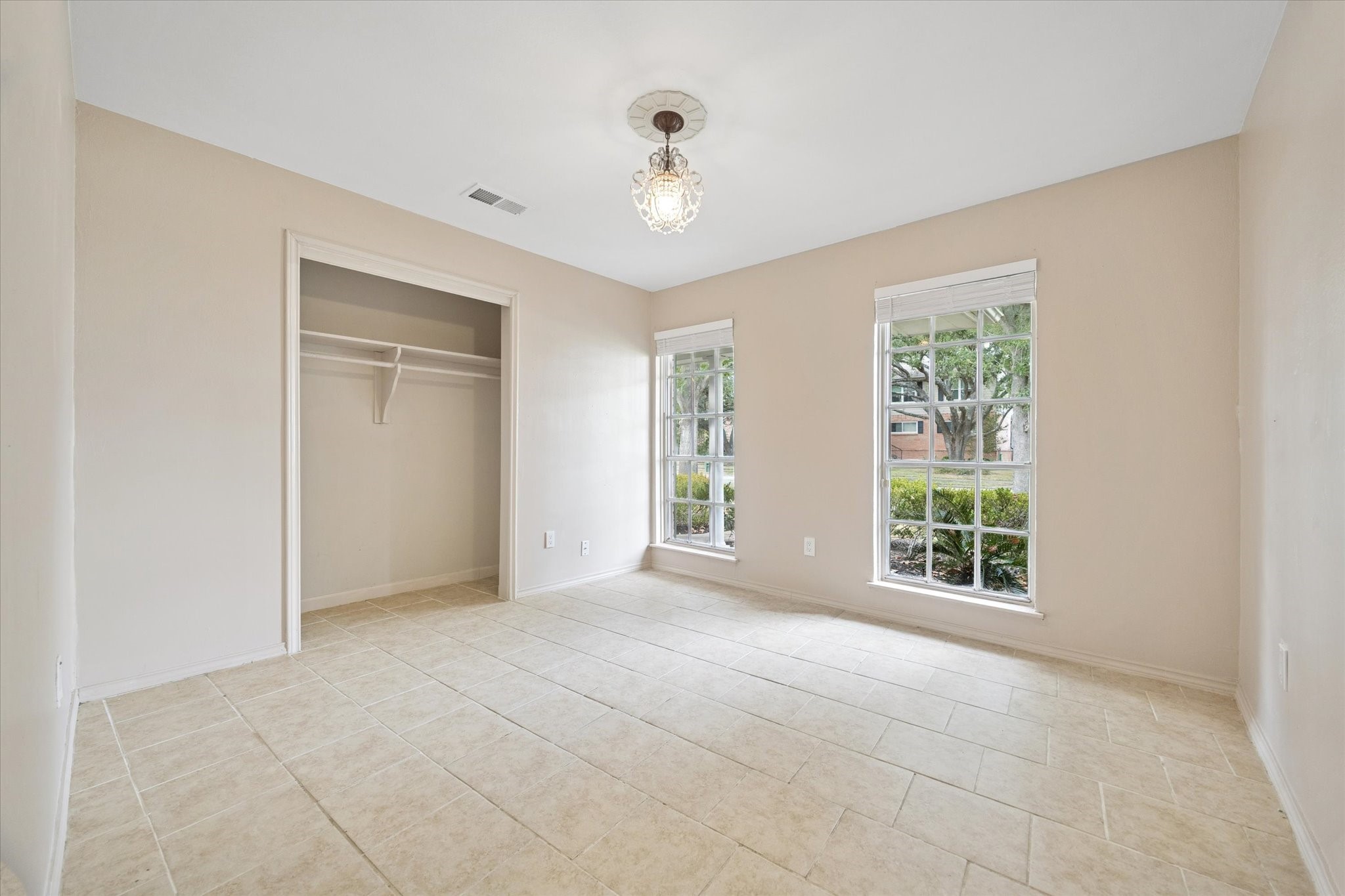 4919 Valkeith Drive Houston, TX 77096 - Photo 19 of 29 a view of an empty room with a window