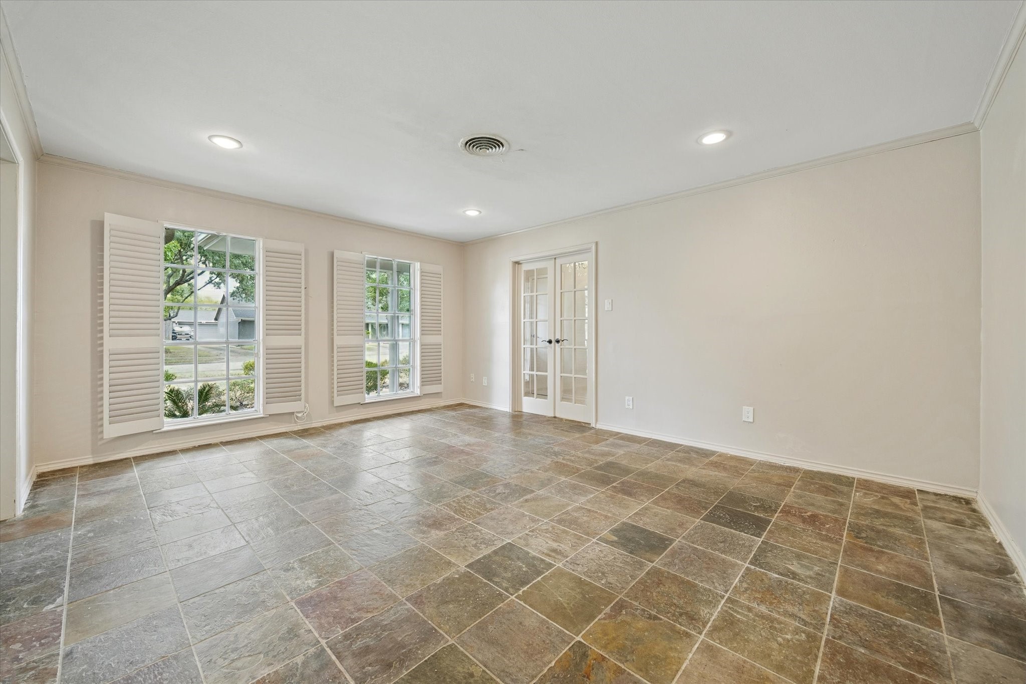 4919 Valkeith Drive Houston, TX 77096 - Photo 4 of 29 a view of an empty room with a window