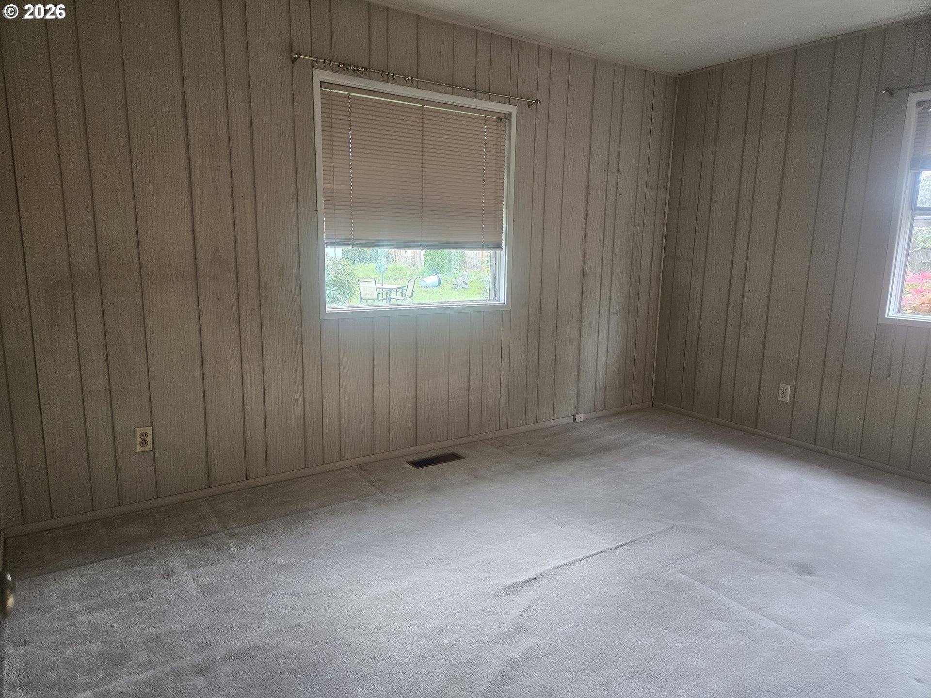 3405 Southeast 69th Avenue Portland, OR 97206 - Photo 12 of 23 a view of an empty room with a window