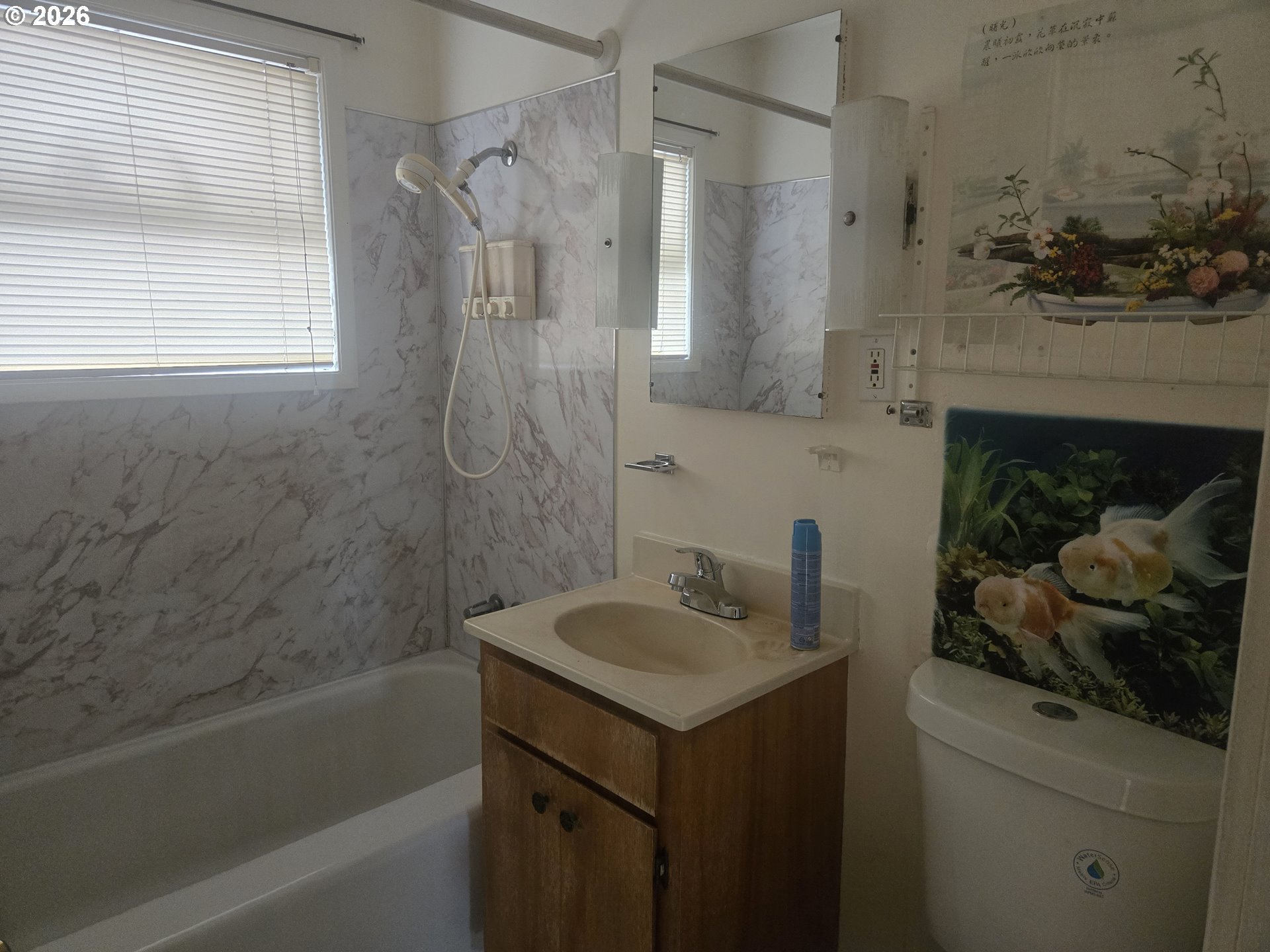 3405 Southeast 69th Avenue Portland, OR 97206 - Photo 16 of 23 a bathroom with a sink and a bathtub
