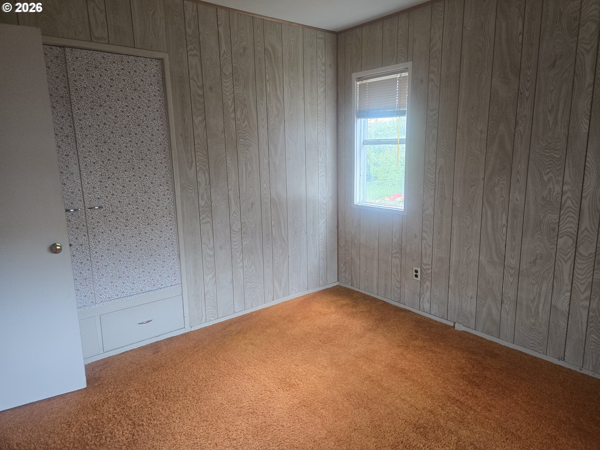 3405 Southeast 69th Avenue Portland, OR 97206 - Photo 18 of 23 a view of an empty room with wooden floor