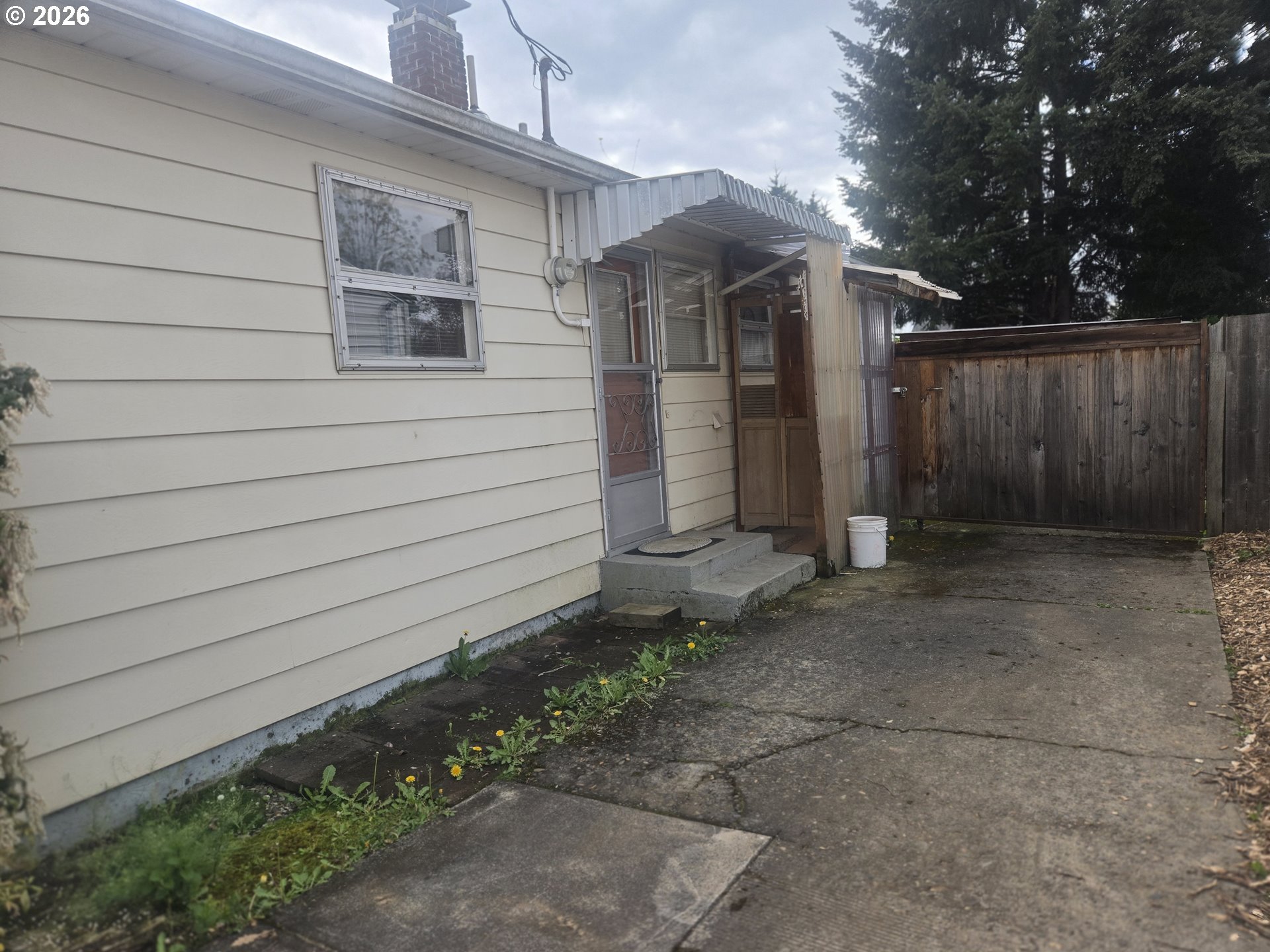 3405 Southeast 69th Avenue Portland, OR 97206 - Photo 23 of 23 a view of a house with a backyard
