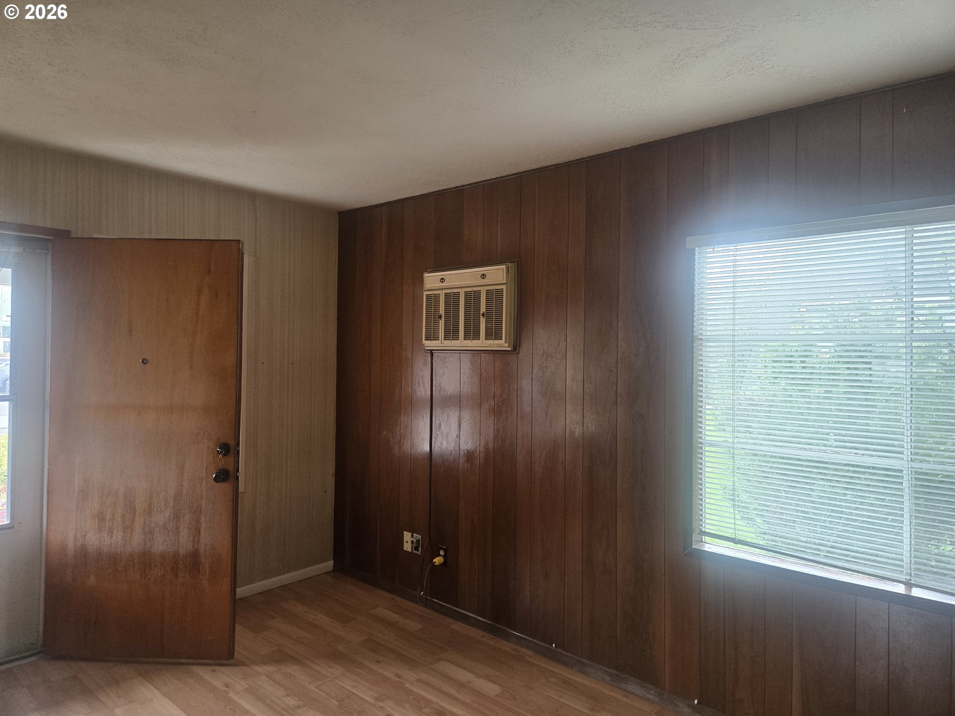 3405 Southeast 69th Avenue Portland, OR 97206 - Photo 5 of 23 a view of an empty room with a window