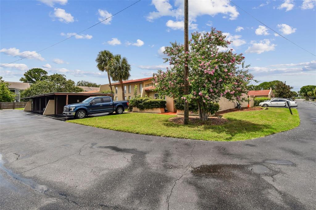 7200 Ulmerton Road, Unit E3 Largo, FL 33771 - Photo 20 of 26 a view of a fountain in front of a house