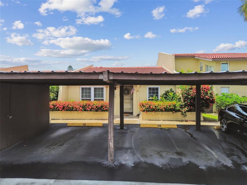 7200 Ulmerton Road, Unit E3 Largo, FL 33771 - Photo 21 of 26 a view of outdoor space with a garden