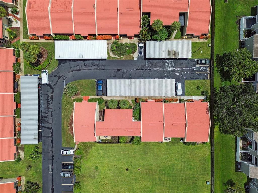 7200 Ulmerton Road, Unit E3 Largo, FL 33771 - Photo 22 of 26 an aerial view of a house with a yard