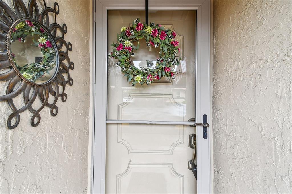7200 Ulmerton Road, Unit E3 Largo, FL 33771 - Photo 3 of 26 a flowers room with a rug