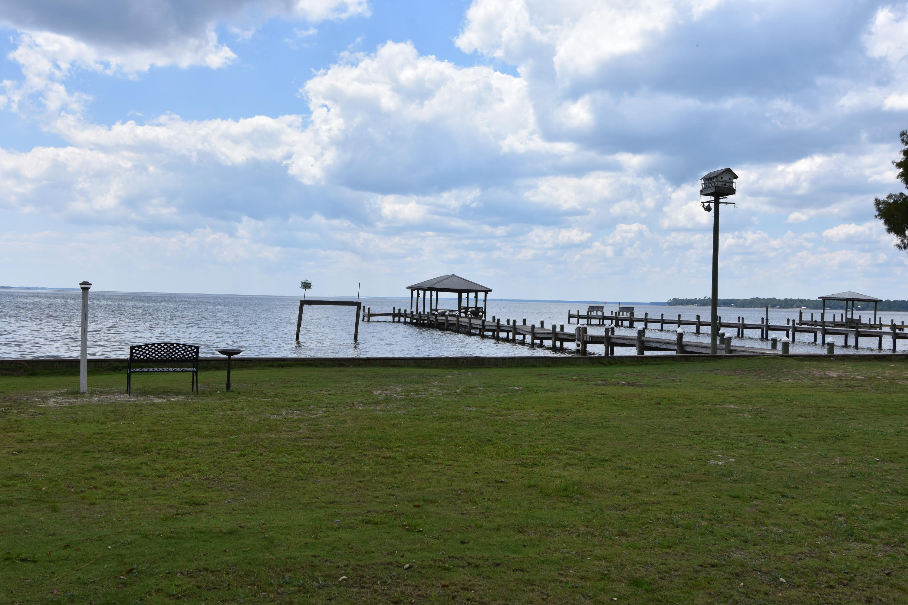 2292 Bay Grove Road Freeport, FL 32439 - Photo 28 of 47 a view of a lake with a big yard