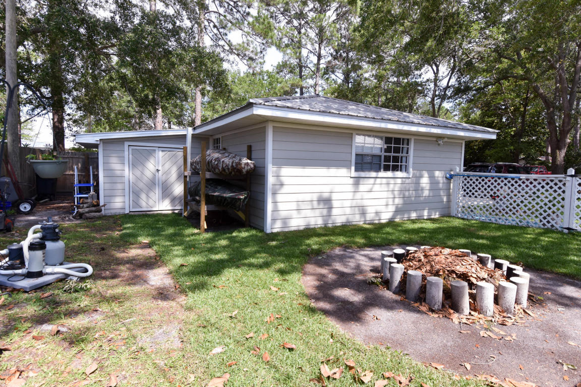 2292 Bay Grove Road Freeport, FL 32439 - Photo 40 of 47 a view of a house with a yard
