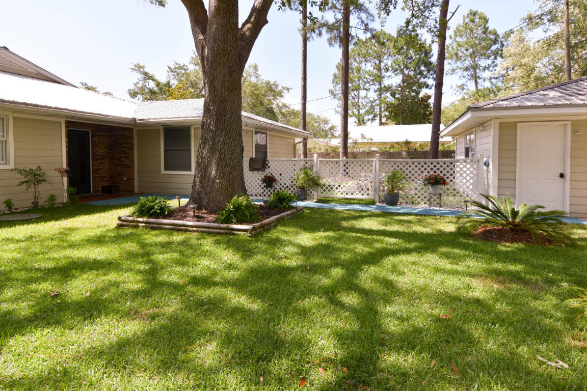 2292 Bay Grove Road Freeport, FL 32439 - Photo 43 of 47 a view of backyard of house with green space