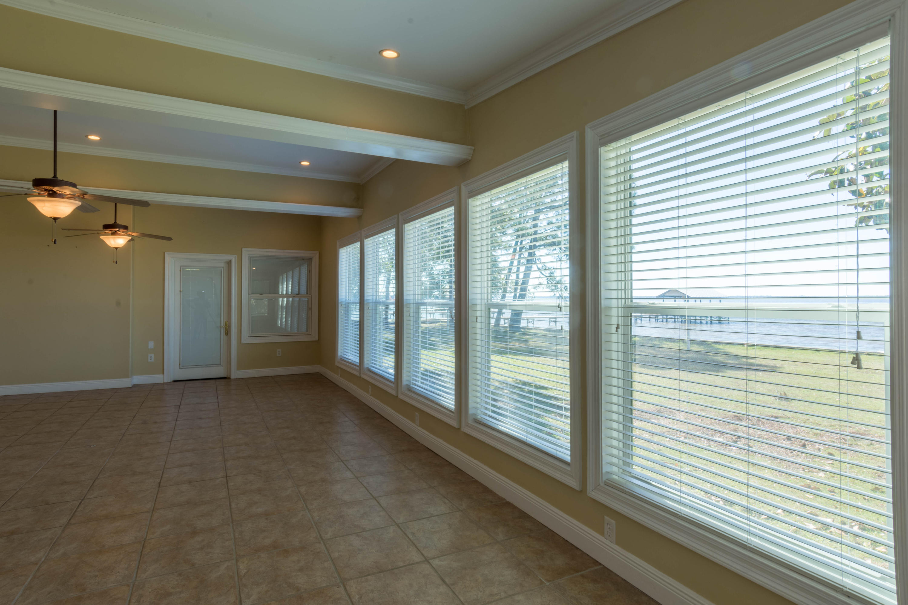 2292 Bay Grove Road Freeport, FL 32439 - Photo 5 of 47 a view of a room with large windows