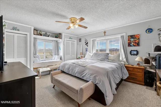 a bathroom with a double vanity sink mirror and shower