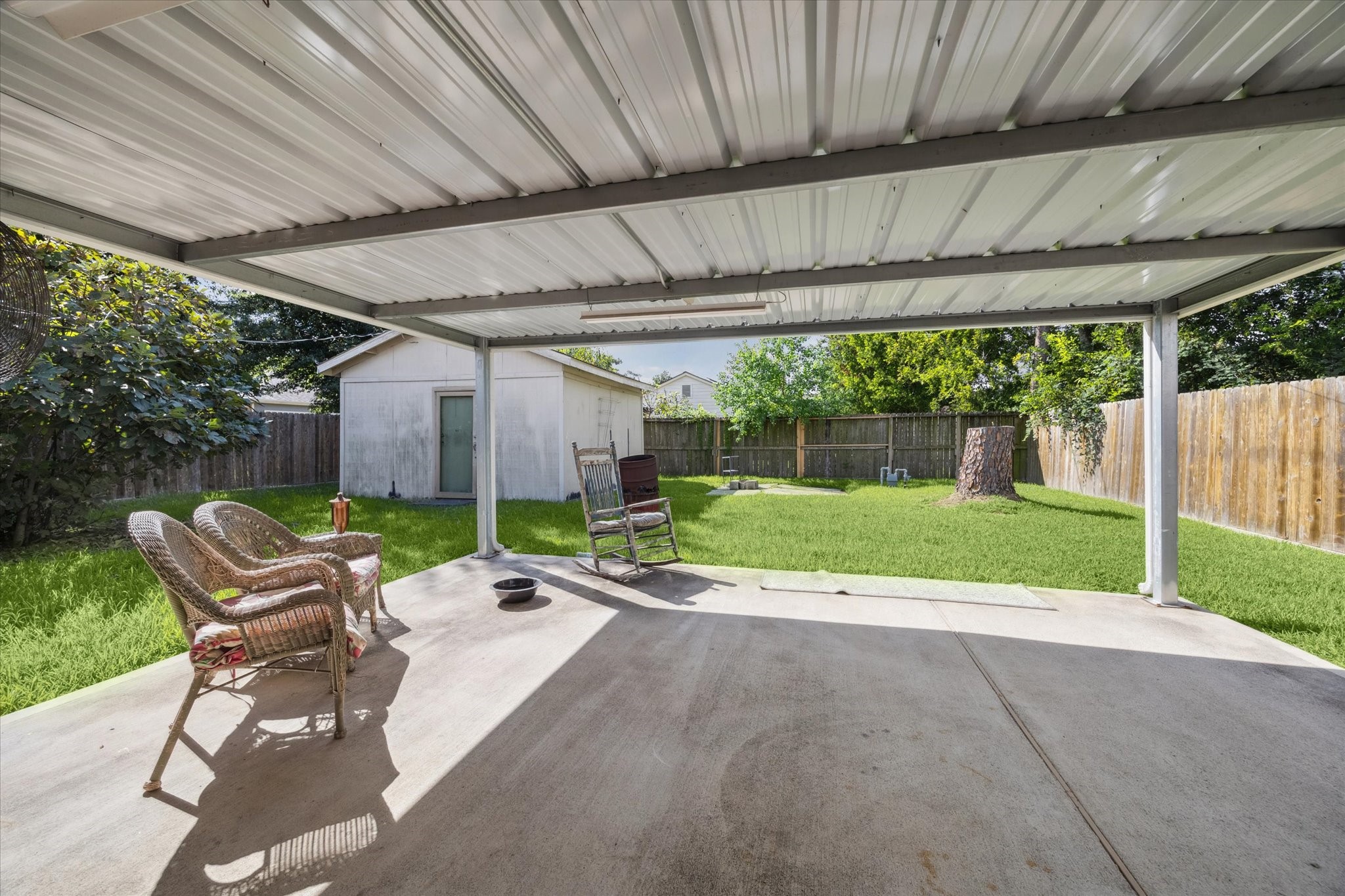 5618 Sweetbriar Street Houston, TX 77017 - Photo 14 of 15 a patio with yard table and chairs