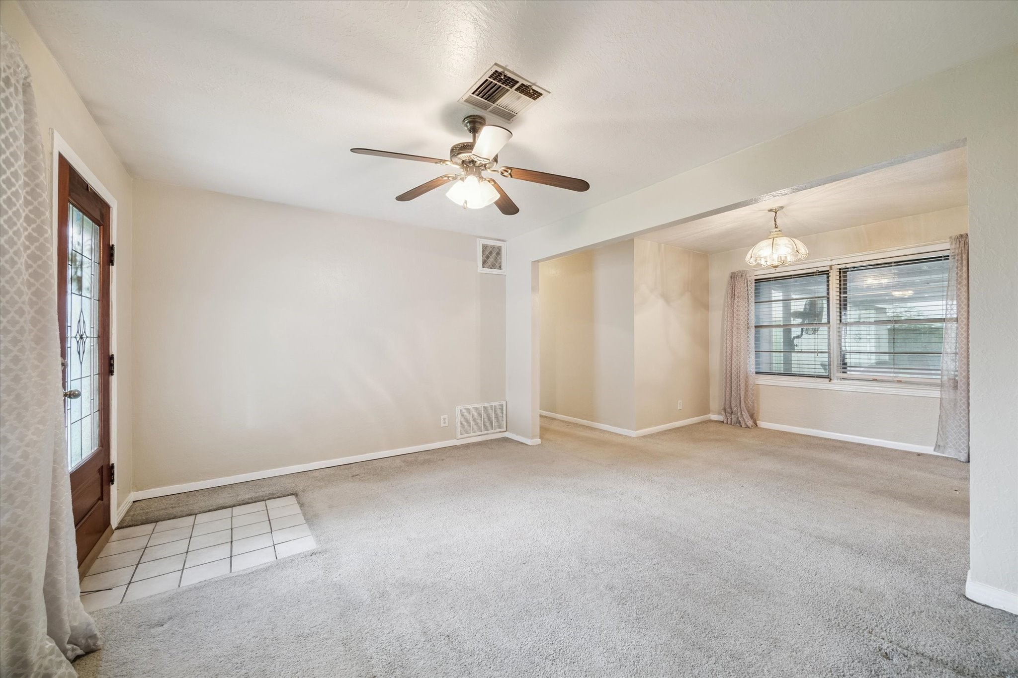 5618 Sweetbriar Street Houston, TX 77017 - Photo 4 of 15 a view of an empty room with a window
