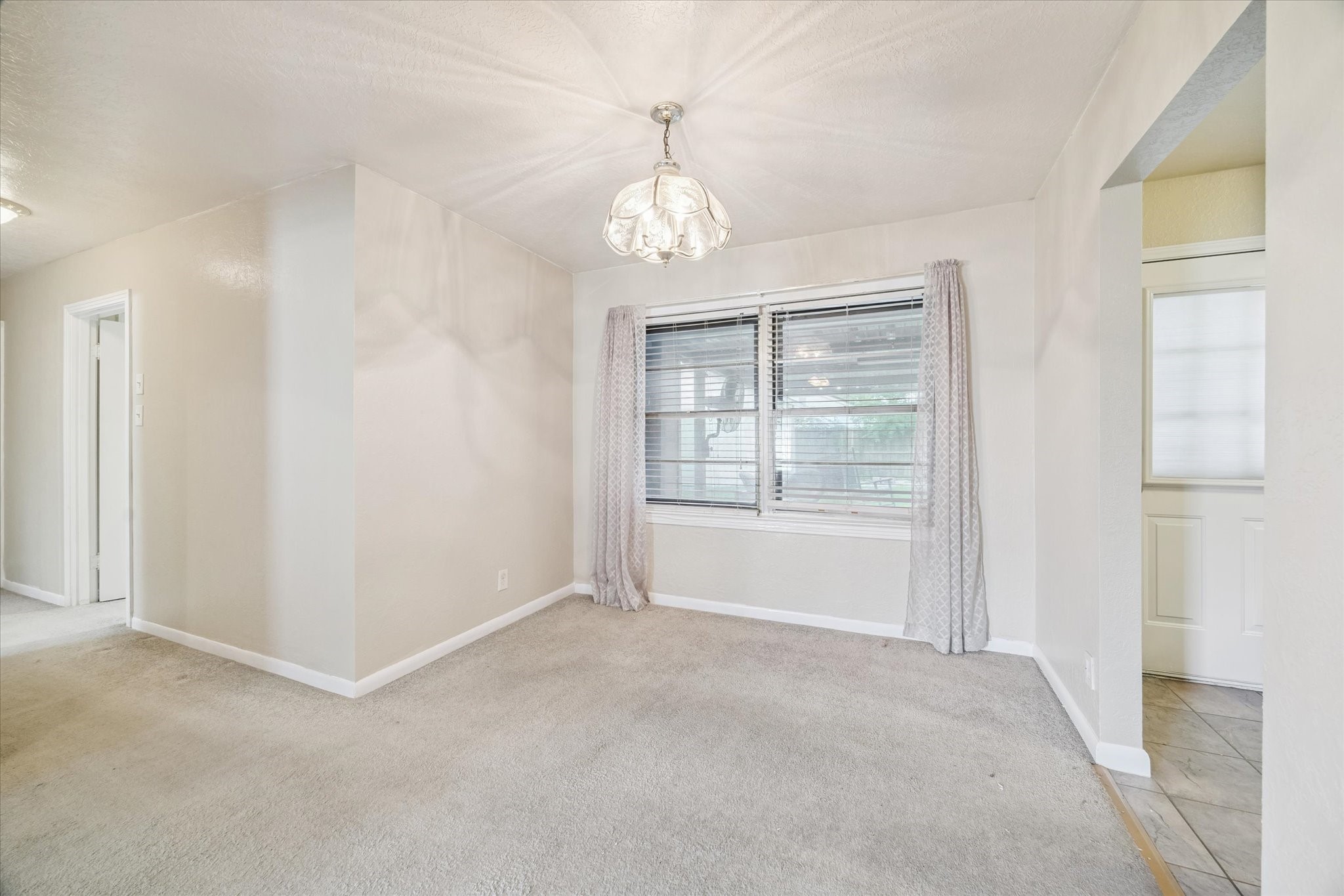 5618 Sweetbriar Street Houston, TX 77017 - Photo 5 of 15 a view of an empty room with a window