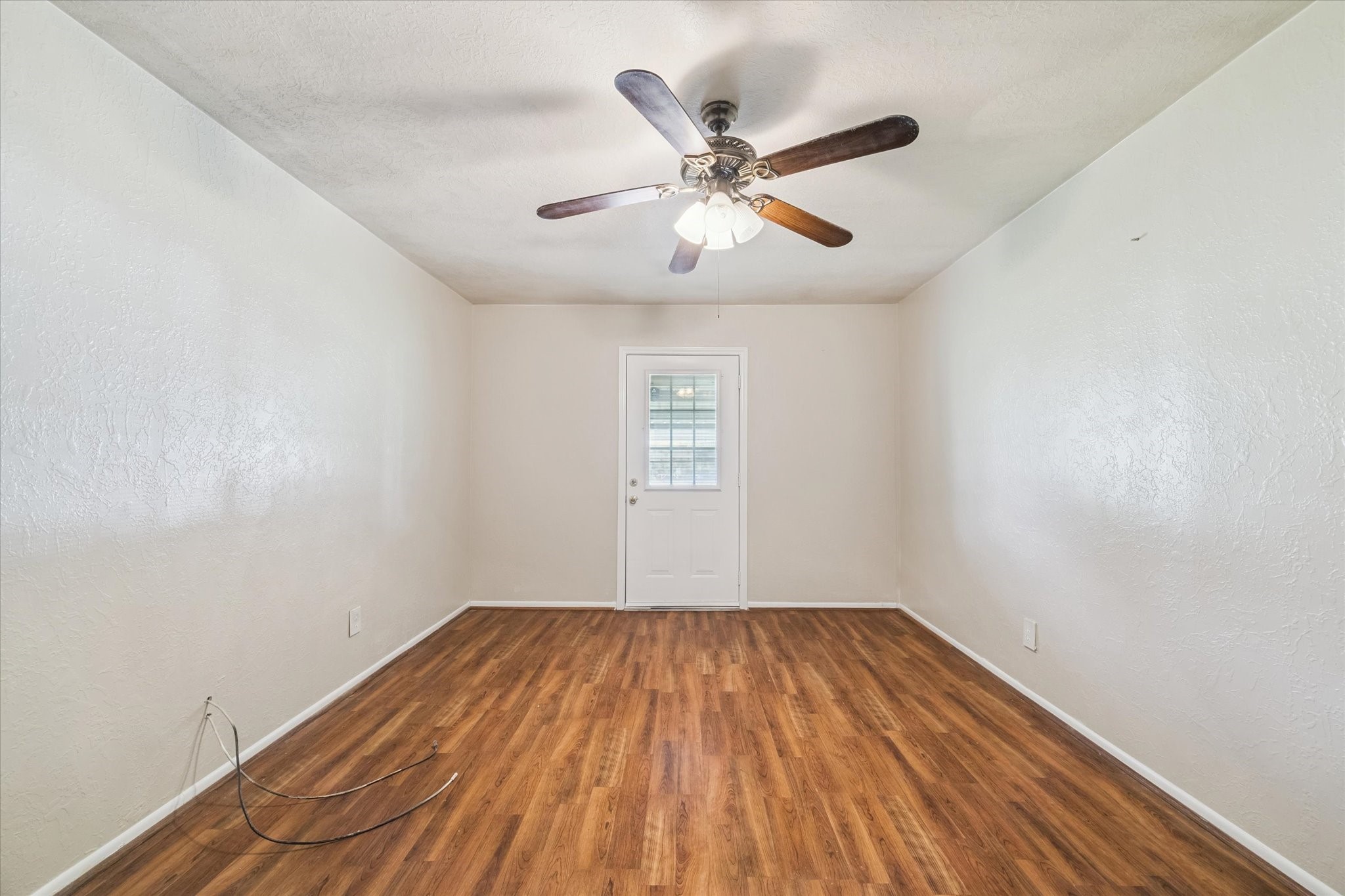 5618 Sweetbriar Street Houston, TX 77017 - Photo 10 of 15 a view of empty room with wooden floor