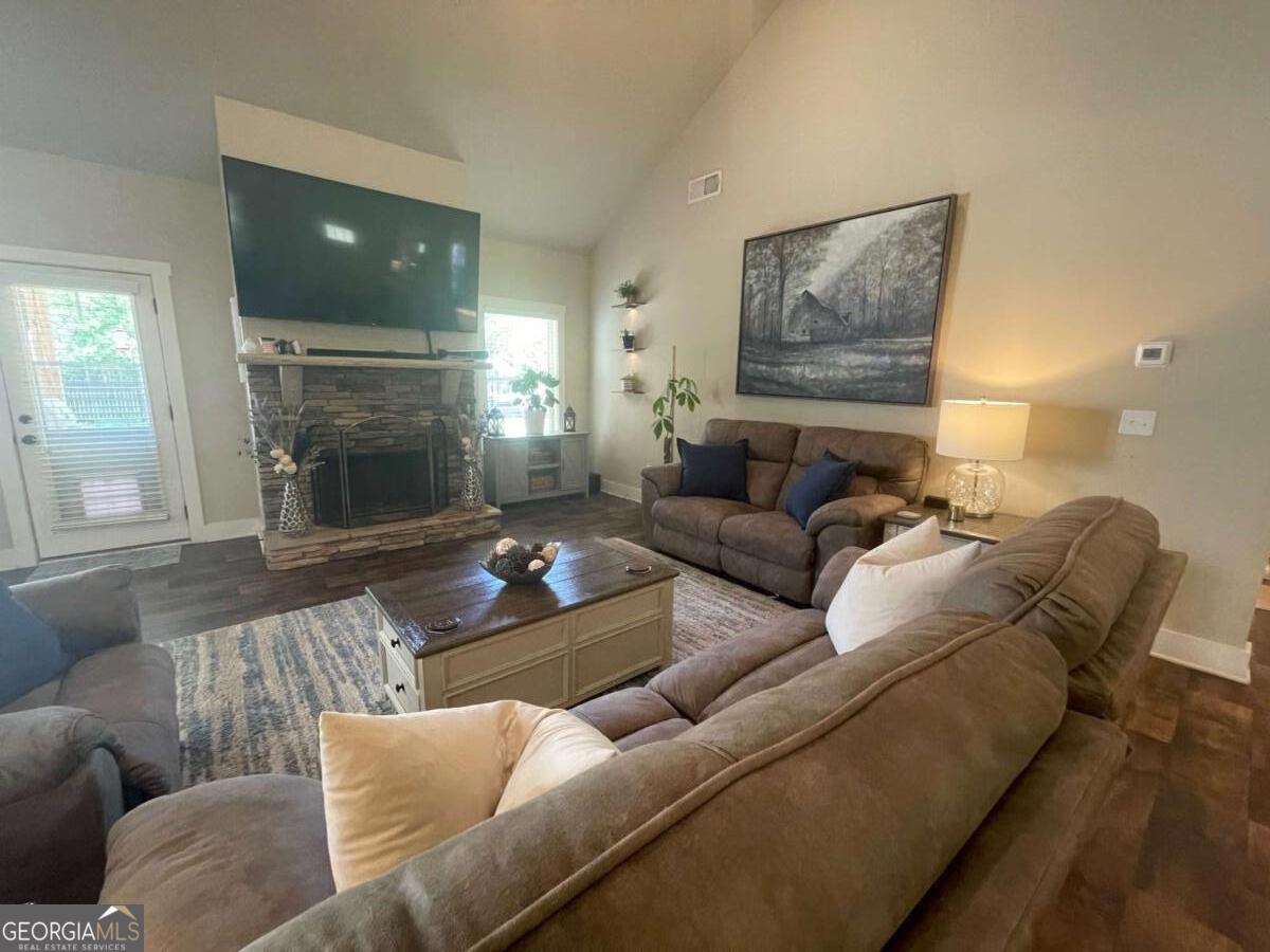 457 Old Good Hope Road Good Hope, GA 30641 - Photo 5 of 59 a living room with furniture and a fireplace