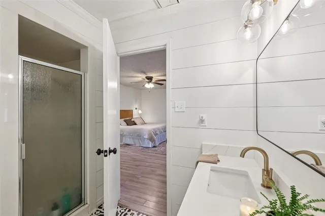 a view of entryway with workspace and a window