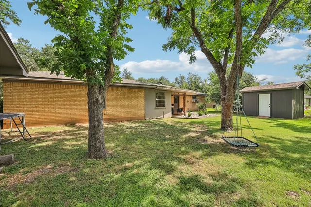 a house view with a garden space