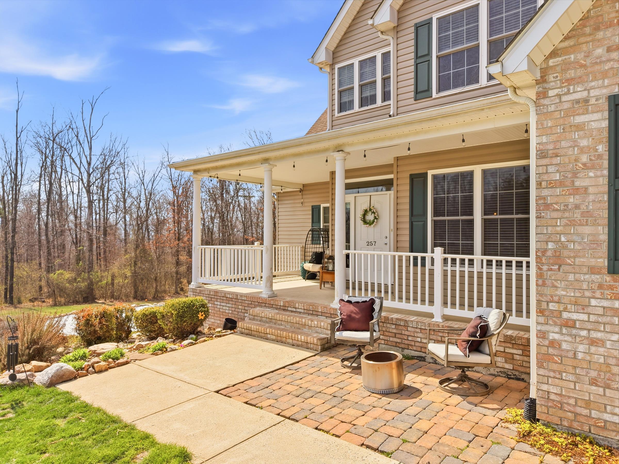 257 Hunter Road Maurertown, VA 22644 - Photo 46 of 61 a view of a patio with a table and chairs and wooden fence