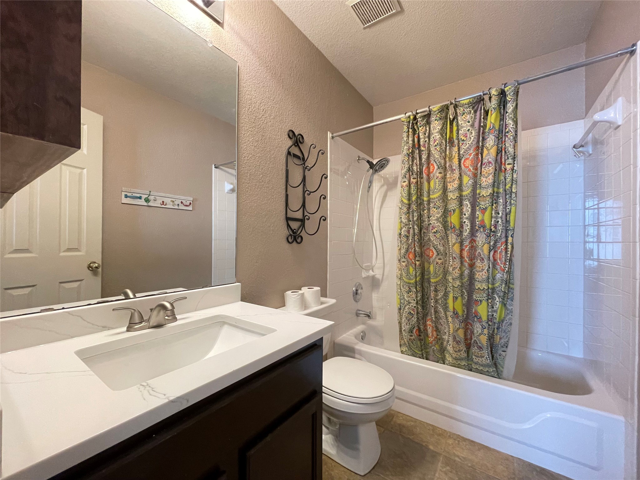 3638 Windhill Loop Round Rock, TX 78681 - Photo 18 of 32 Bathroom featuring a dark wood-finish vanity with a white countertop and integrated sink