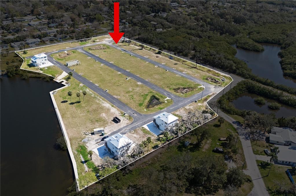 4864 Hermes Way New Port Richey, FL 34652 - Photo 4 of 9 an aerial view of a house