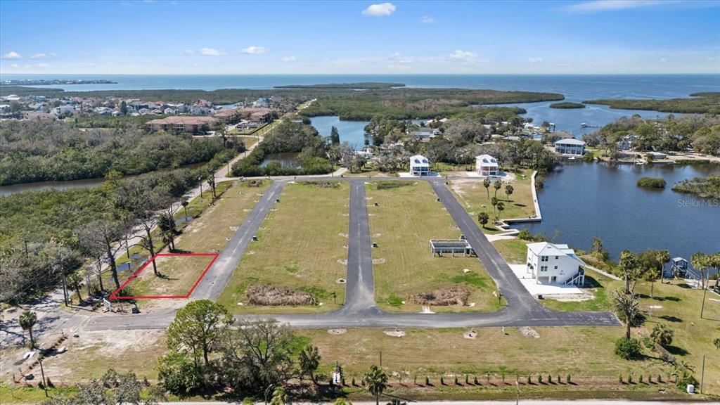 4864 Hermes Way New Port Richey, FL 34652 - Photo 8 of 9 an aerial view of a residential houses with outdoor space