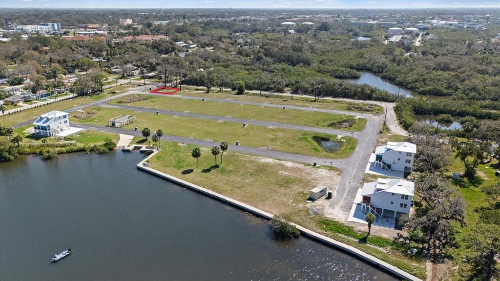 4864 Hermes Way New Port Richey, FL 34652 - Photo 9 of 9 an aerial view of residential houses with outdoor space and river