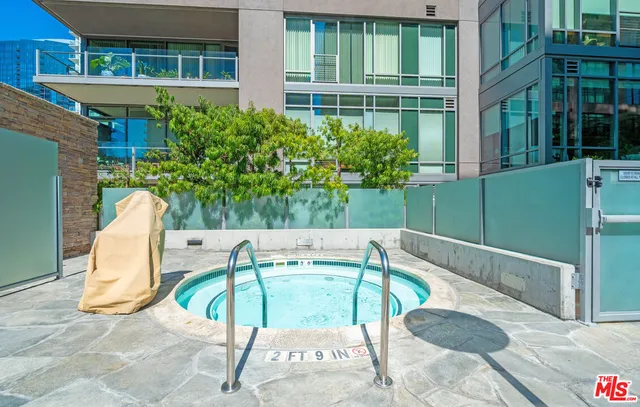 a view of a swimming pool with a lounge chairs