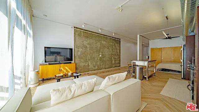 a living room with a couch and a table