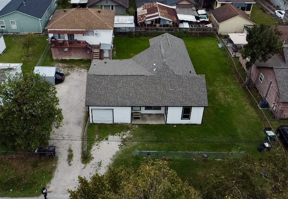 6929 San Angelo Street Houston, TX 77020 - Photo 2 of 24 an aerial view of a house with a yard
